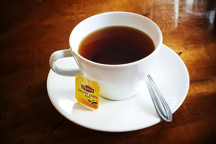 Mang thai uống trà Lipton được không