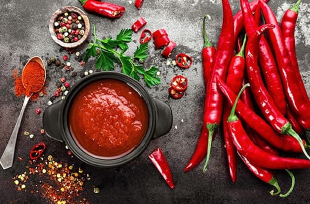 Nên hạn chế đồ ăn cay nóng nếu không muốn gan bị tổn thương.