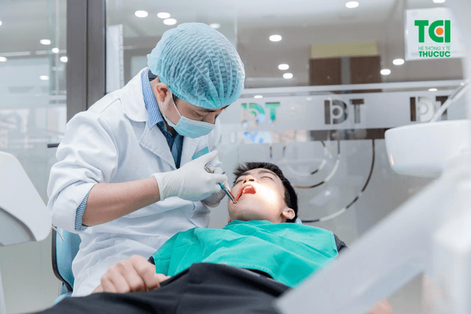 nhổ răng khôn bị sót chân răng