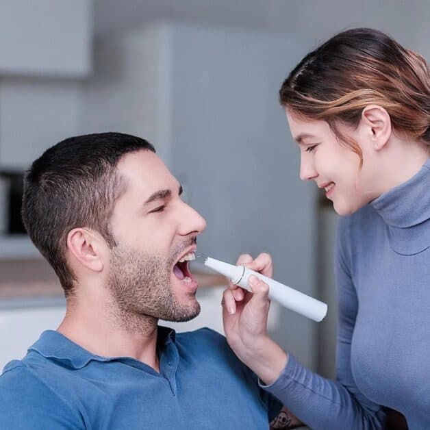 đánh bay cao răng tại nhà với máy cạo cao răng