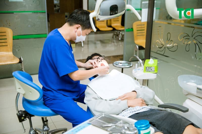 lấy cao răng mất bao tiền