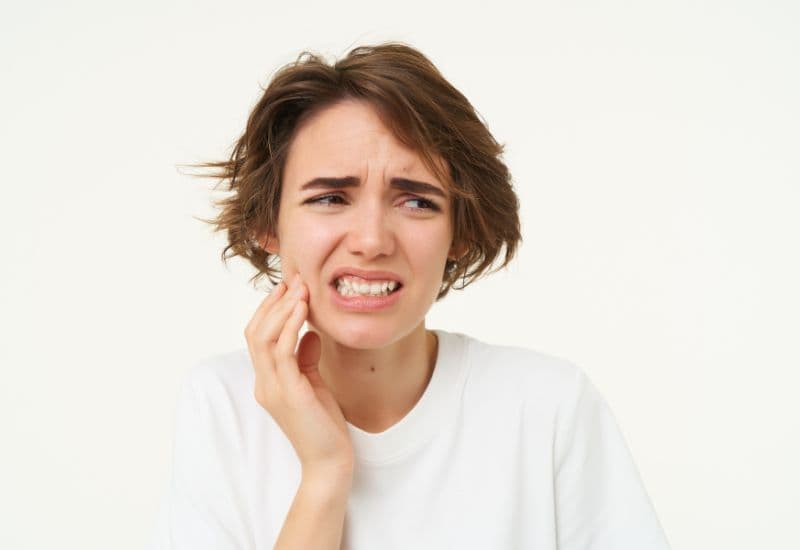 nhổ răng bao lâu thì trồng răng giả