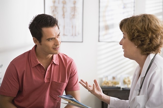 Female Doctor and Male Patient
