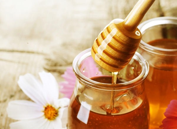 Không nên uống mật ong khi bị sốt