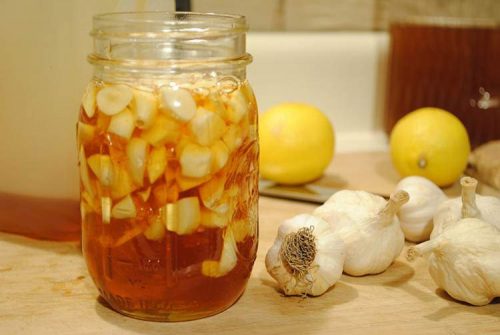 Uống rượu tỏi chữa đầy hơi ăn không tiêu Uống rượu tỏi chữa đầy hơi ăn không tiêu
