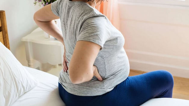 xoa bóp chữa đau thần kinh tọa khi mang thai 3 tháng đầu