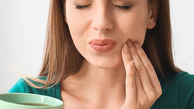 Đau răng có thể là một trong số những dấu hiệu viêm lợi trùm
