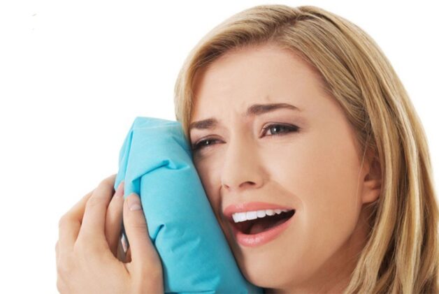 Nhổ răng khôn đau họng phải làm sao